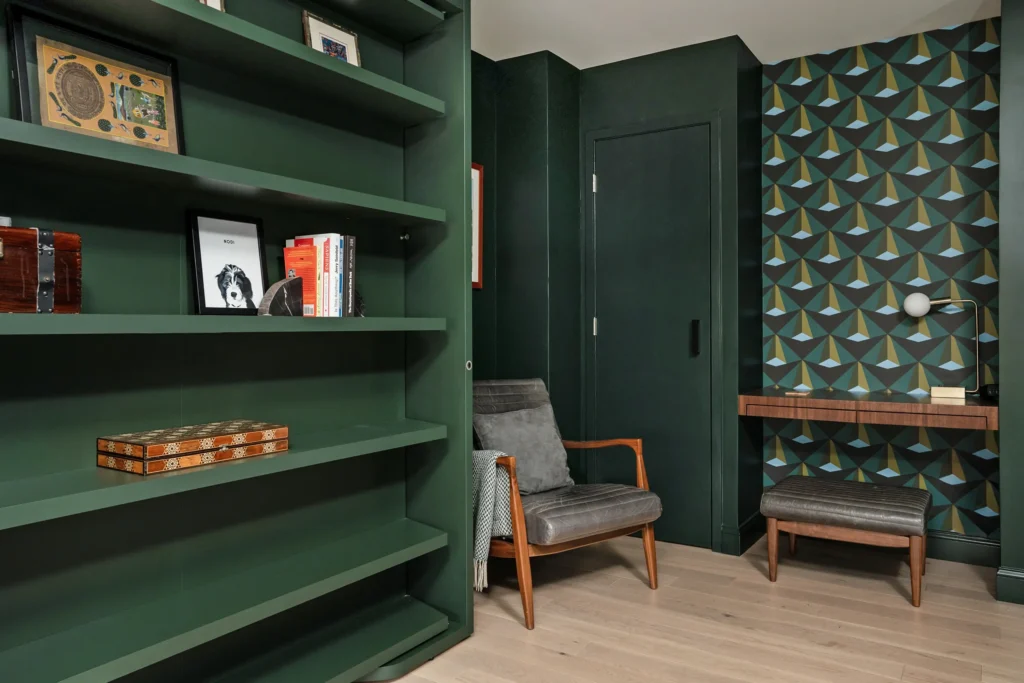 bookcase turn murphy bed matches the wall color - floating walnut desk