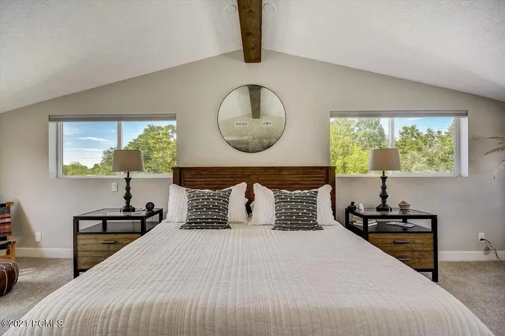 bedroom with windows above the nightables